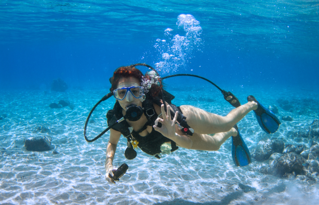 A try diver exploring the underwater while scuba diving